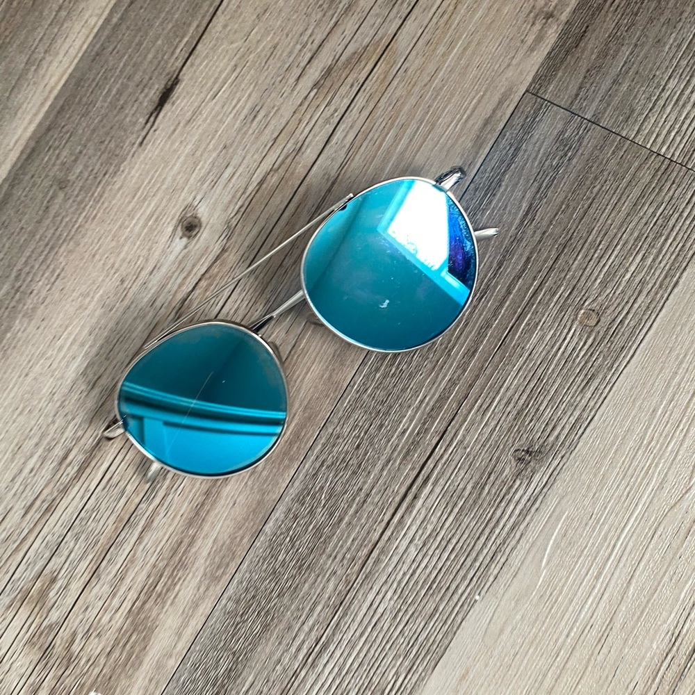 blue tinted mirrored sunglasses